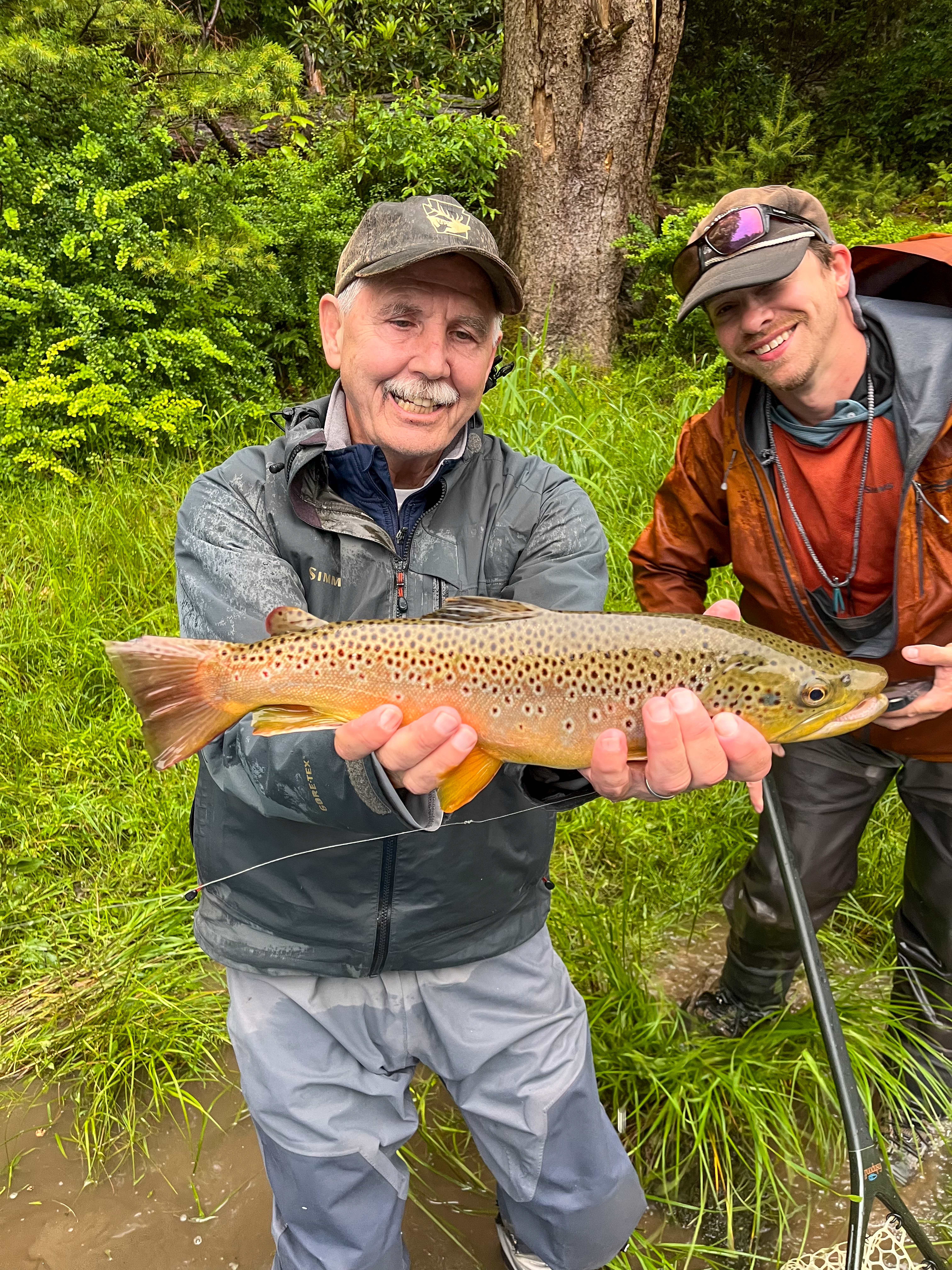 Fly fishing guide meeting with client before guided trip